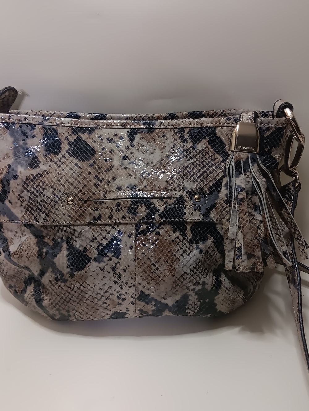 B. Makowsky Snake-Print Crossbody Bag with Tassel Accent in Beige and Black